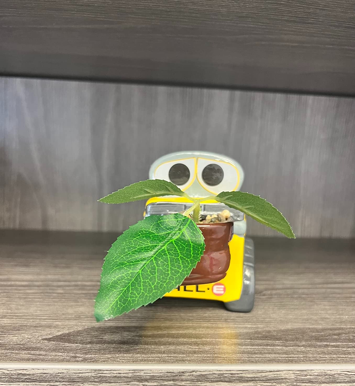 Silver Buffalo Disney Pixar Wall-E - 4 Inch Mini Ceramic Planter with Artificial Succulents, Cute Small Pot, Faux Indoor Plant for Desk Shelf